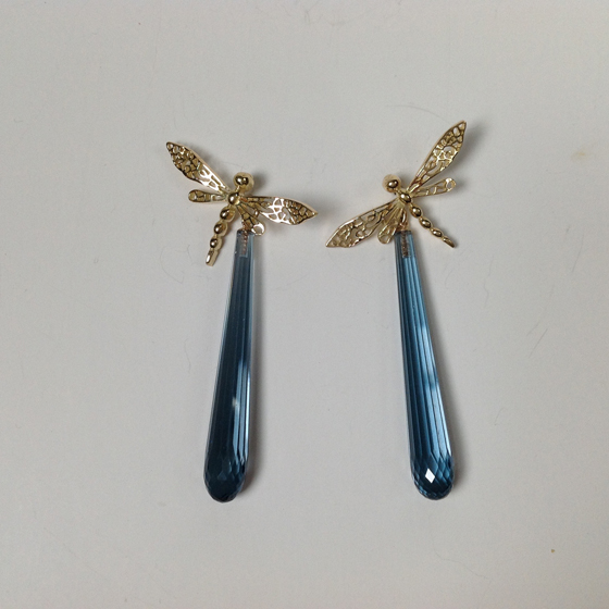 18 karat carved blue topaz post earrings