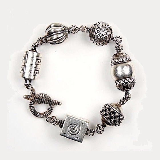 Bracelet, sterling silver beads, each one a unique design